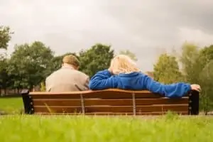 Senior Couple Waiting and Relaxed in Park