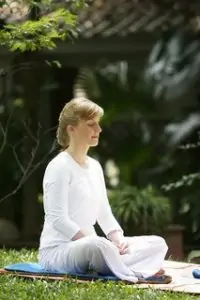 Woman Meditates for Peace of Mind